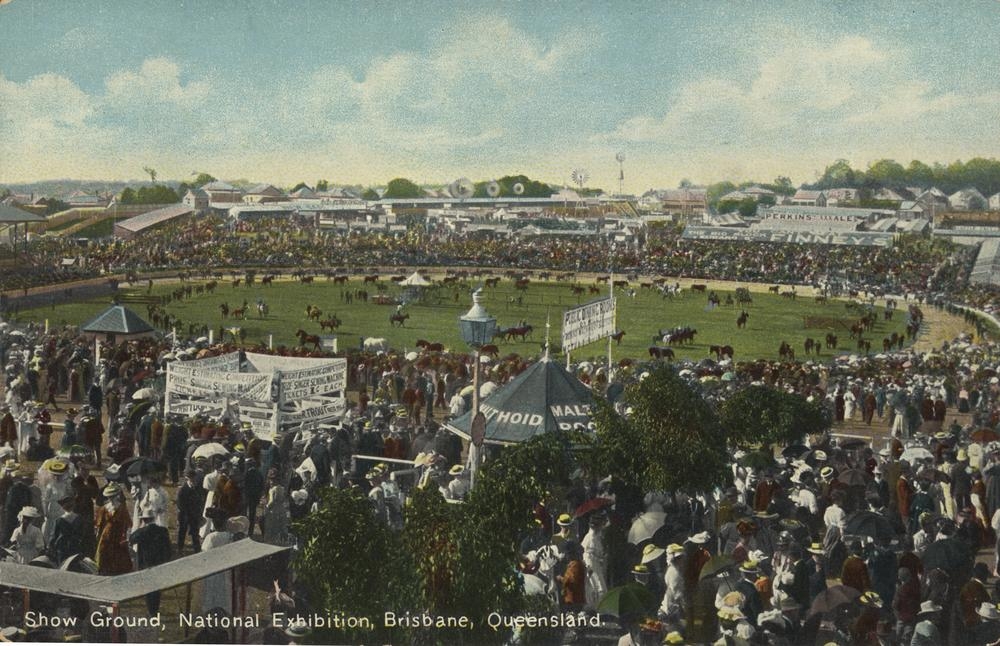 Colour postcard view of crowds and a show ring at the National Exhibition show grounds in Brisbane, dated 1905.